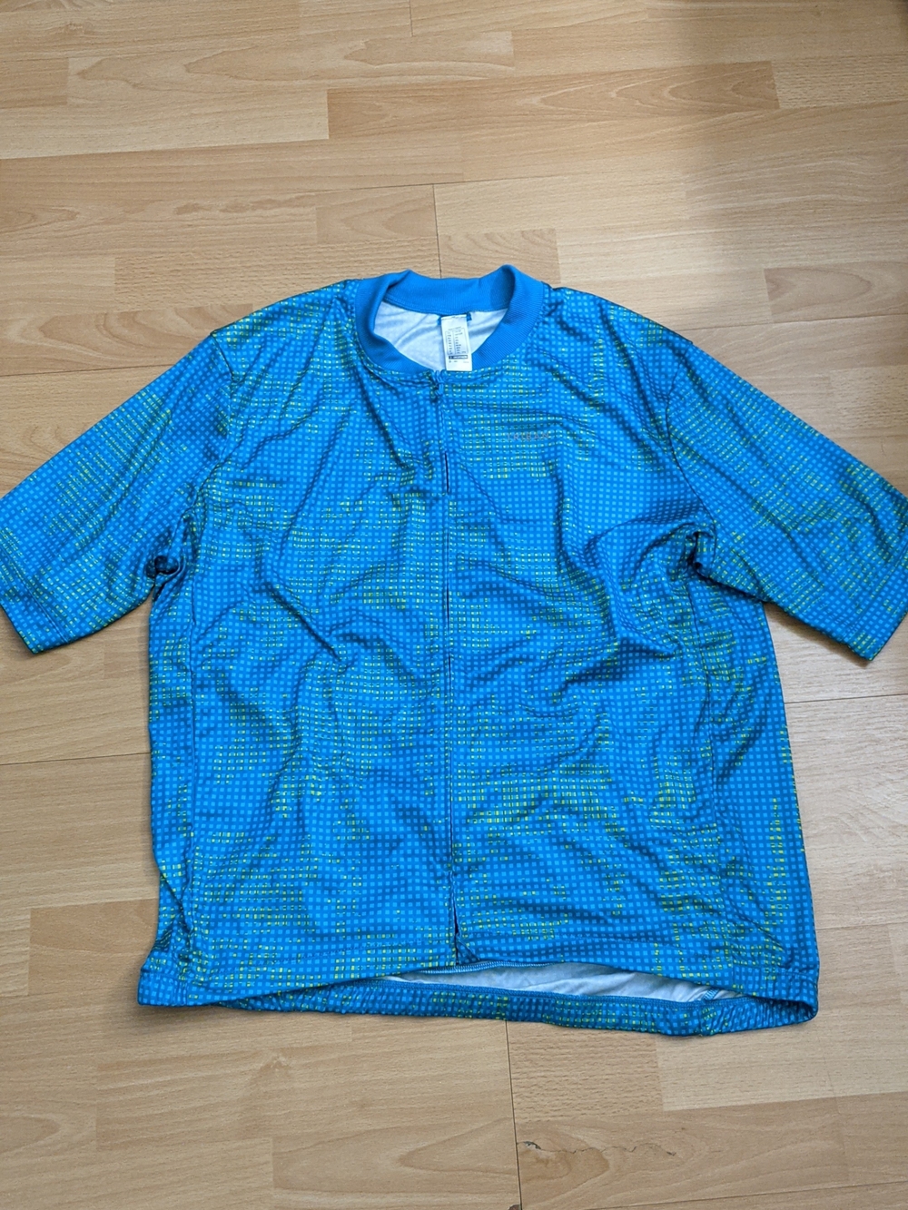 Men's Blue Short-Sleeve Zip Front Athletic Top Vélo  Non-smoking and pet-free